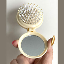 Folding hair brush with mirror, perfect for men, women, and girls