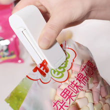 Handheld plastic bag heat sealer